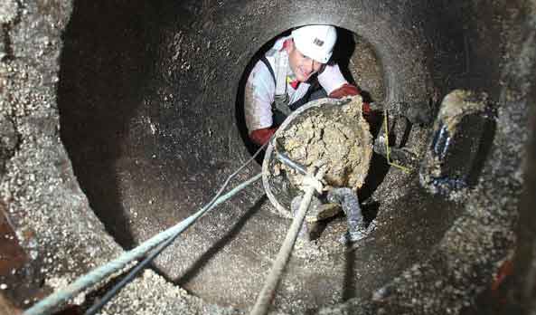 Bucket of fat from pipes